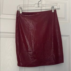 Maroon snake skin mini skirt size small